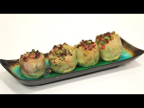 شاهد طريقة عمل طاجن خرشوف بالبسلة