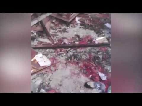 شاهد  مواطنون يجمعون أشلاء ضحايا الكاتدرائية