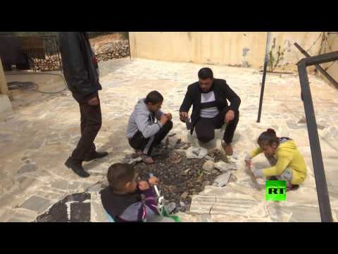 بالفيديو مشاهد من قرية عنبة الأردنية التي سقطت فيها شظايا صواريخ