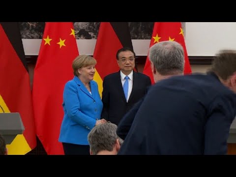 شاهد ميركل ورئيس وزراء الصين يدافعان عن الاتفاق النووي الإيراني