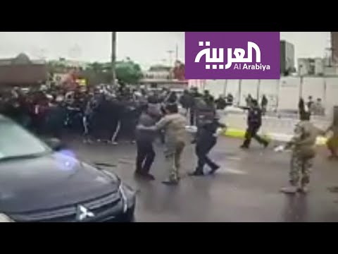 تدافع الأمن العراقي وزوار كسروا حظر التجول في الكاظمية