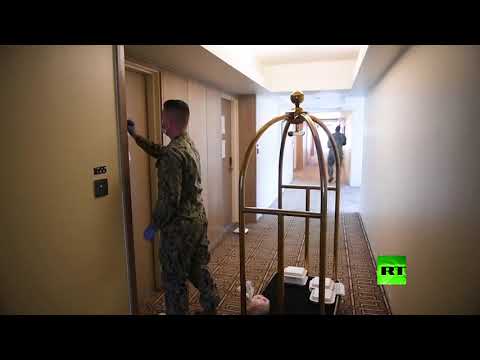 فيديو من على متن حاملة طائرات أمريكية موبوءة بكورونا