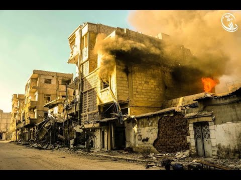 شاهد قصف داريا بالبراميل المتفجرة والنابالم