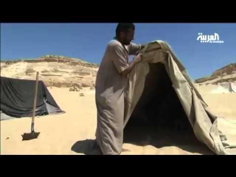 شاهد العلاج بالدفن في رمال مصر الحارة