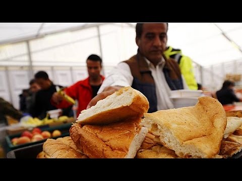 شاهدوزير الداخلية الألماني يغير موقفه بشأن اللاجئين