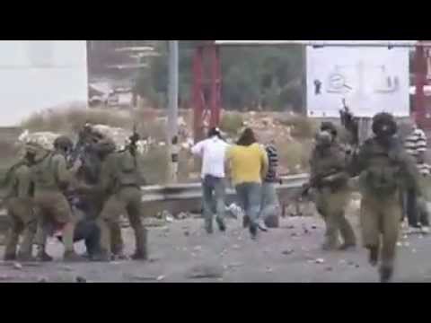 اسرائيلى يطلق رصاصة من مسافة صفر أو أقل على فلسطينى