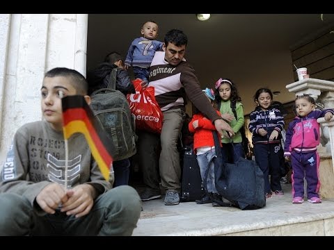 شاهد ألماني تتوقع أكثر من مليون لاجئ في 2015