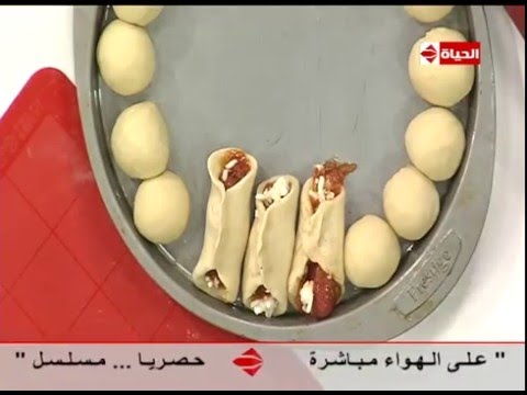 طريقة عمل بيتزا السوسيس عجلة السوسيس