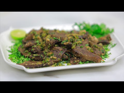 طريقة عمل فشة وطحال بالثوم