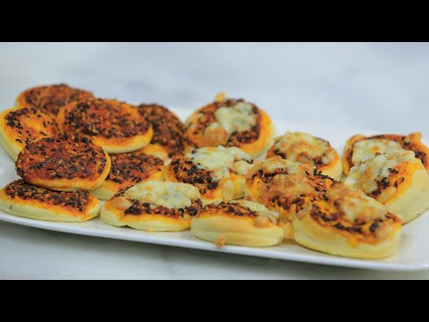 شاهد طريقة عمل فطائر بالصلصة  والجبنةشاهد طريقة عمل فطائر بالصلصة  والجبنة